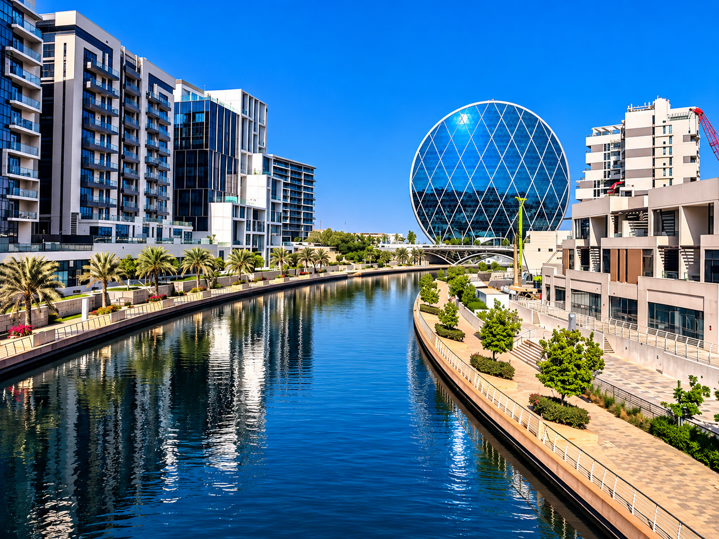 Circular glass Aldar headquarters building in Abu Dhabi.